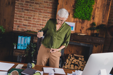 Photo of lady office worker manager spill coffee on herself messy table interior indoors