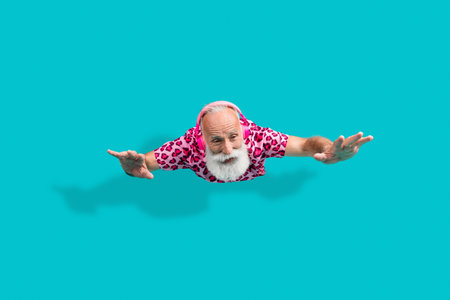 Full body photo of attractive senior bearded man flying headphones dressed stylish pink leopard...