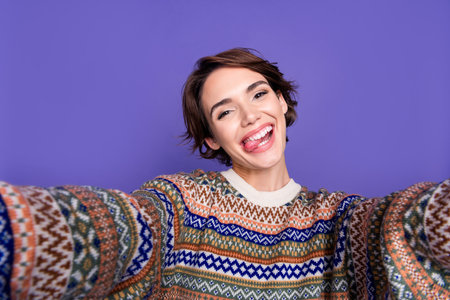 Photo of cheerful lovely nice woman wear stylish clothes have fun isolated on purple color...