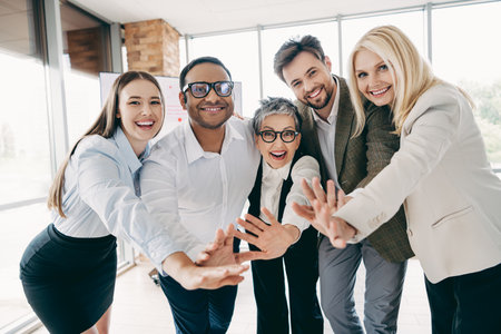 Diverse group of professionals showcasing collaboration and teamwork in modern office environment