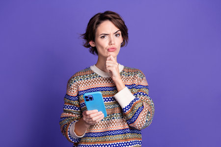 Photo of cheerful positive glad woman wear trendy clothes hold gadget arm touch face isolated on...