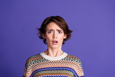 Photo of cute pretty worried nervous woman wear stylish clothes isolated on purple color background