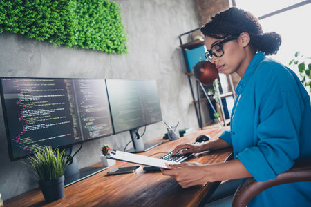 Photo of lovely young lady report documents coding it developer dressed blue shirt comfortable...