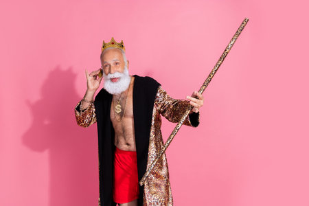 Portrait of isolated on eccentric grandfather halloween leopard robe gold diadem speak cellphone...