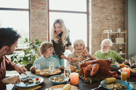 Whimsical and warm thanksgiving gathering with family and friends around a festive turkey feast in a...