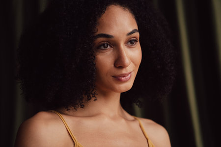 No retouch photo of charming girl wear trendy yellow top isolated on fabric khaki color backgroundの写真素材