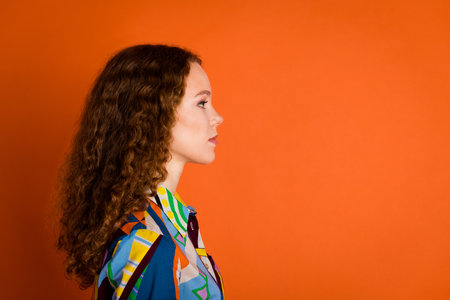 Profile side photo of lovely gorgeous girl wear trendy print clothes look empty space isolated on...
