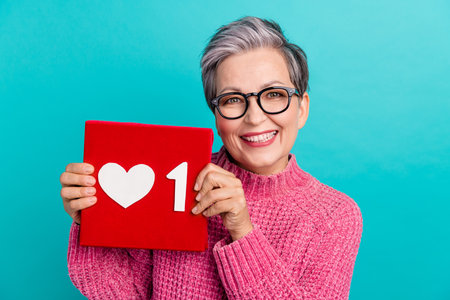 Portrait of good mood person wear knit pullover in eyewear demonstrate one social media like...