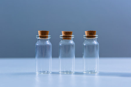 three empty beakers or test tubesの写真素材
