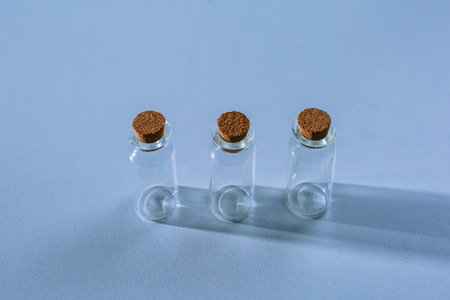 three empty beakers or test tubesの写真素材