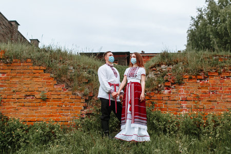 Reconstruction of traditional Russian dresses. Lovers in natureの写真素材