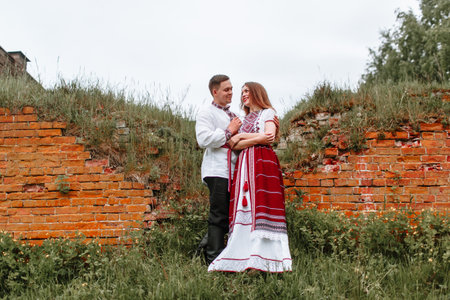 Reconstruction of traditional Russian dresses. Lovers in nature