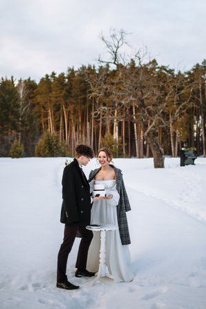 Shooting in the winter forestの写真素材