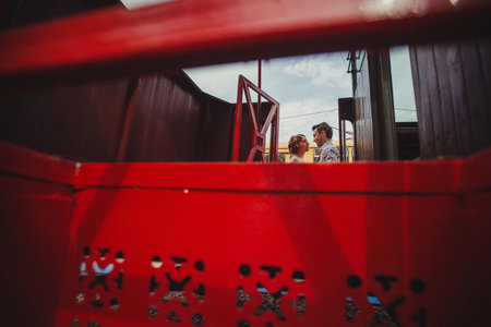 A guy and a girl in 60s clothes are standingの写真素材