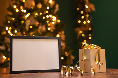 Christmas background with frame and gift boxの写真素材