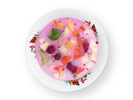 Top view  Sop Buah or Es buah is an Indonesian iced fruit cocktail dessert isolated on white backgroundの写真素材
