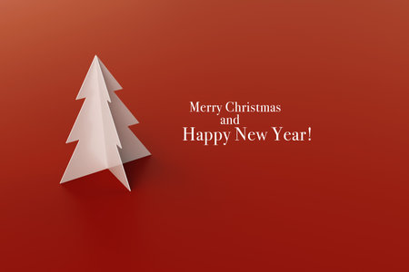 Christmas tree isolated on red backgroundの写真素材