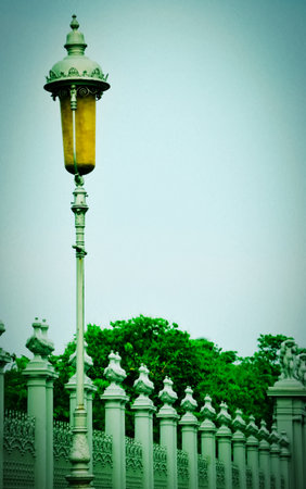 Antique metal street lamp with vintage  backgroundの写真素材