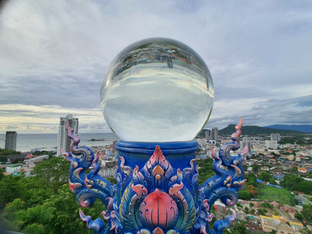Crystal ball in front of the temple in Pattaya, Thailand.の写真素材