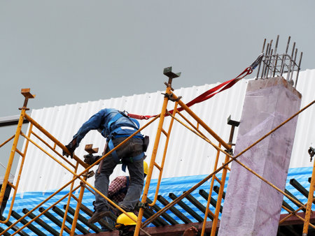 n Working on the Working at height on construction site with blue sky
