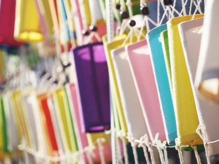 Colorful paper lamp hanging on parkの写真素材