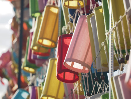 Colorful paper lamp hanging on parkの写真素材