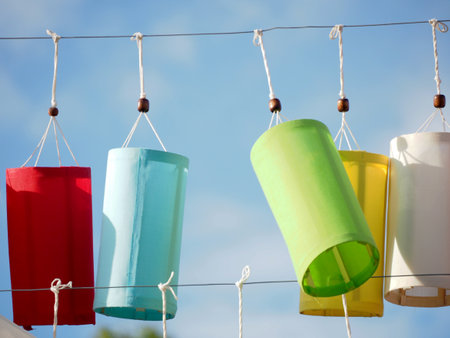 Colorful paper lamp hanging on parkの写真素材