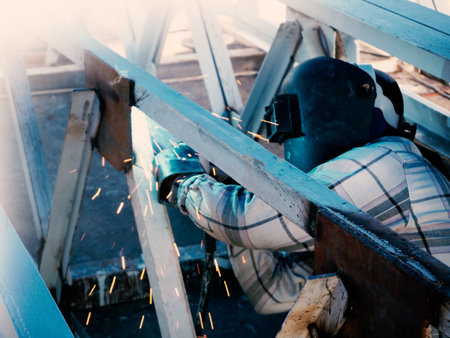 Welding work ,worker with protective welding metal on constructionの写真素材