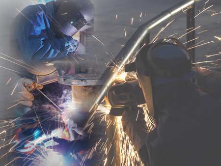 Welding work ,worker with protective welding metal on construction