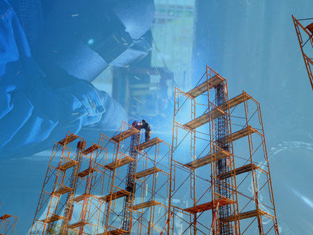 Man Working on the Working at height on construction site with blue sky