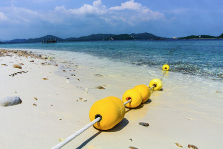 Long holiday with white sand and blue seaの写真素材