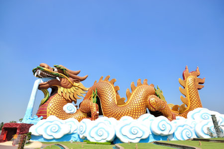 Giant Dragon statue with blue skyの写真素材