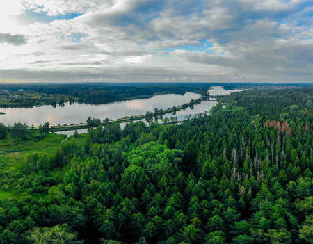 shot from drone of green forest and river in Russia.の写真素材
