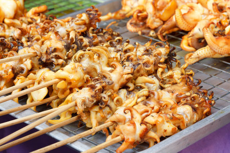 squid stick on grillの写真素材