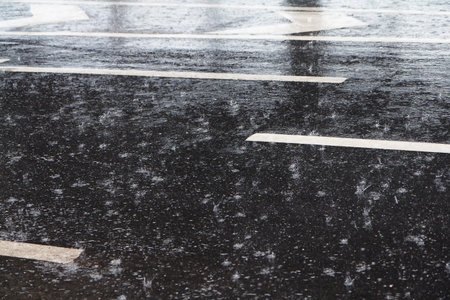 Rain drops on the road