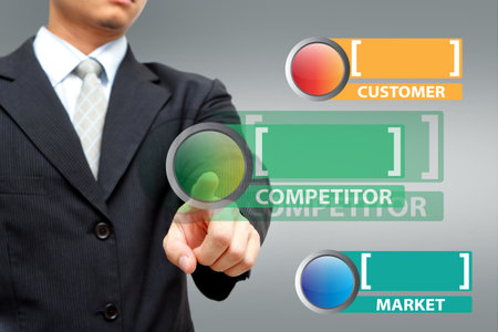 Business man pressing button Chart の写真素材