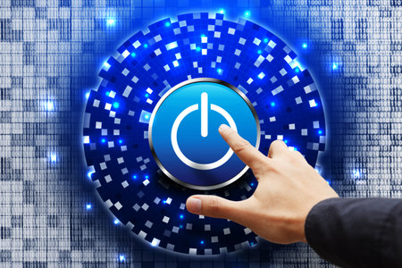 Smart hand press power button on digital background の写真素材