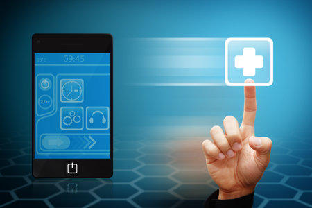 Smart Hand touch the first aid icon from mobile phoneの写真素材