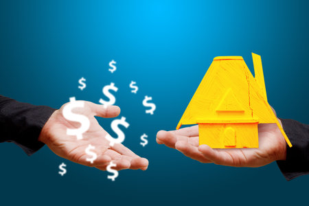 Smart hand grab the wooden House and money icon の写真素材