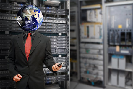 Programmer in data center room waiting for serviceの写真素材