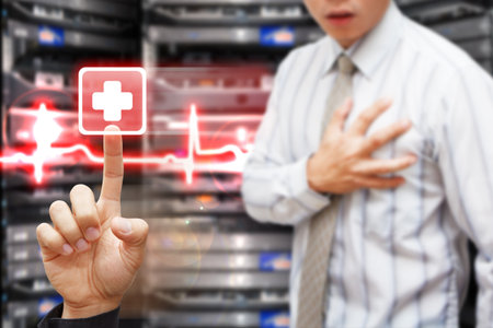 Hand press on First Aid signの写真素材