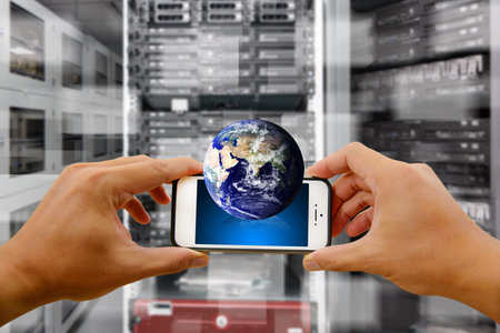 Smart phone in data center room and digital world