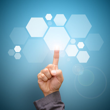 Smart hand touch the polygon in the airの写真素材