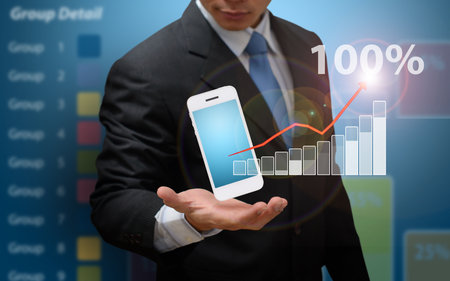 Business people analyzing financial chartsの写真素材