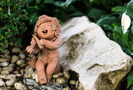 Musician clay sculpture in nature の写真素材