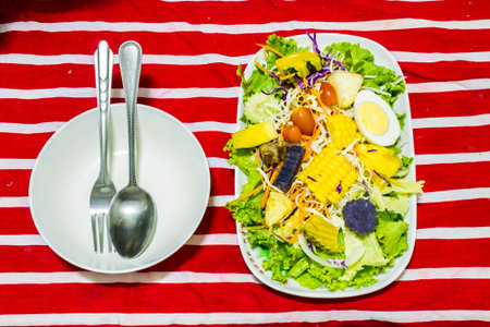 Vegetables and fruits salad with boiled eggの写真素材