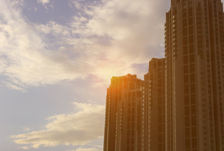 Condominium buildings sun silhouetteの写真素材