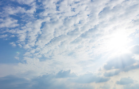 Blue sky with scattered clouds