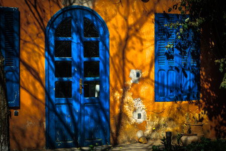 Closed blue windows and blue doorの写真素材