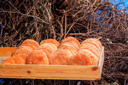 Typical Moroccan cheap bread, placed in a wooden boxの写真素材